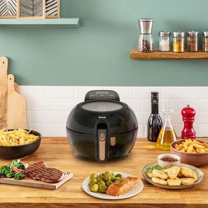 Мультипіч Tefal ActiFry & Grill Genius, 1500Вт, чаша-4л, сенсорне керув., підкл. до смартфону, авто перемішування, пластик, чорно-золотий