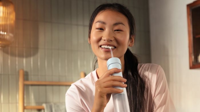 Іригатор Philips портативний Sonicare Compact Flosser 1000, чаша 200 мл, складний, голубий