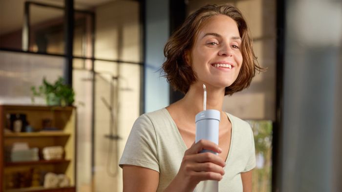 Іригатор Philips портативний Sonicare Compact Flosser 1000, чаша 200 мл, складний, голубий